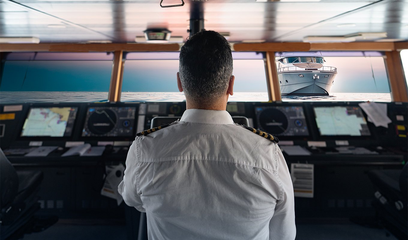 ship captain looking out on the water